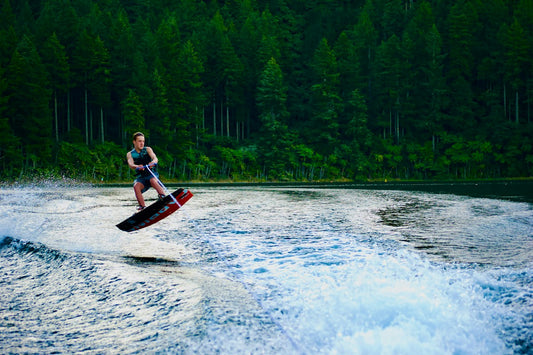 Wakeboarder crossing a lake